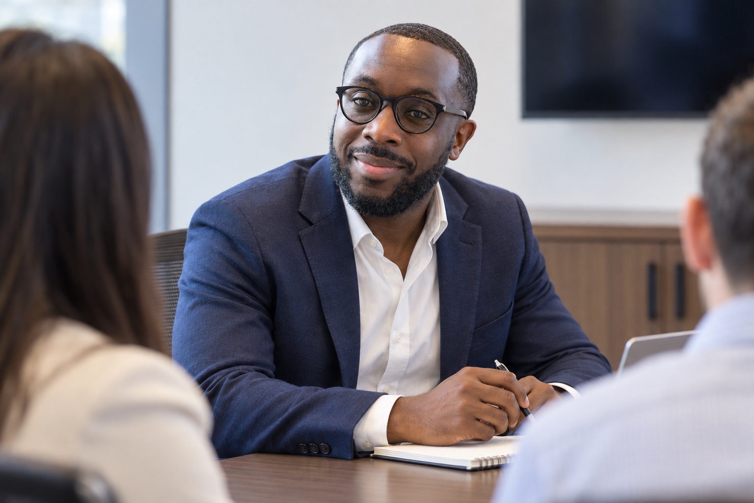 Dr. Jonathan Lotson in a small group coaching conversation